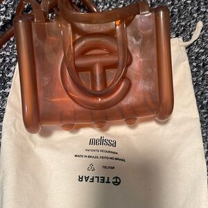 Telfar cross body brown bag .